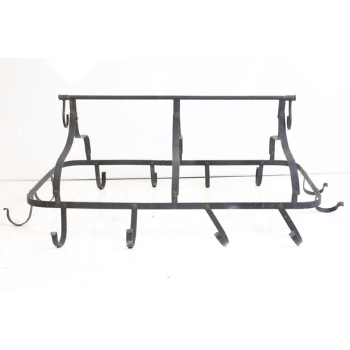 512 - Large Wrought Iron Hanging Games Hooks having a horizontal hanging bar holding a rectangular frame w... 