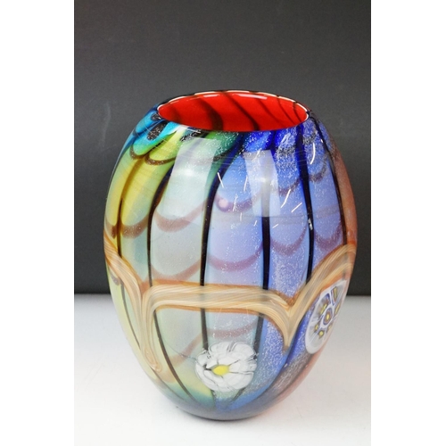 12 - Studio glass tapering vase with mottled rainbow swirl design within a clear glass casing (signed to ... 