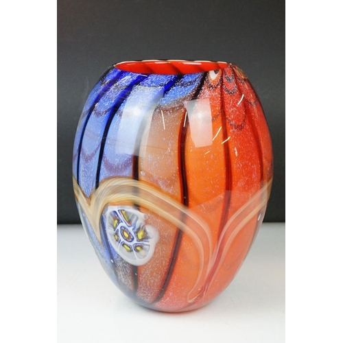 12 - Studio glass tapering vase with mottled rainbow swirl design within a clear glass casing (signed to ... 