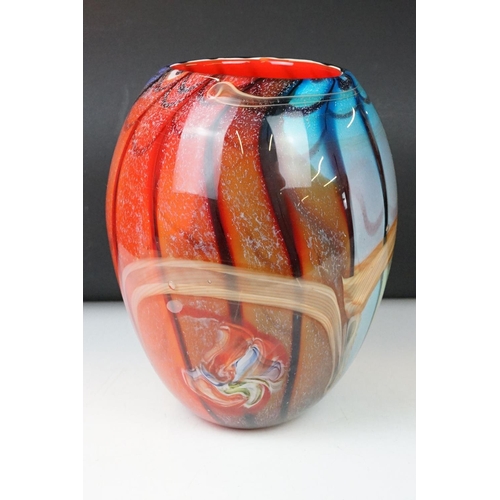 12 - Studio glass tapering vase with mottled rainbow swirl design within a clear glass casing (signed to ... 