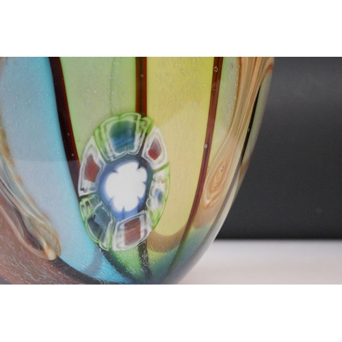 12 - Studio glass tapering vase with mottled rainbow swirl design within a clear glass casing (signed to ... 