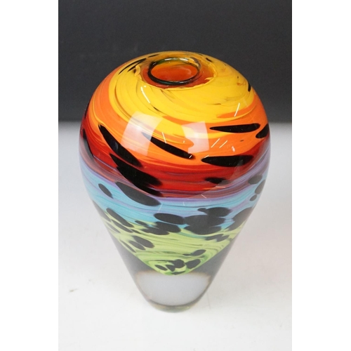 12 - Studio glass tapering vase with mottled rainbow swirl design within a clear glass casing (signed to ... 