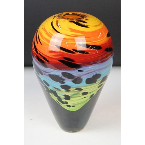 12 - Studio glass tapering vase with mottled rainbow swirl design within a clear glass casing (signed to ... 