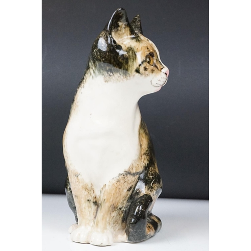 13 - Winstanley Pottery Seated Tabby Cat, with glass eyes, signed to base, measures approx 27.5cm high