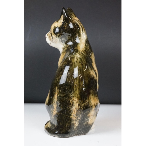 13 - Winstanley Pottery Seated Tabby Cat, with glass eyes, signed to base, measures approx 27.5cm high