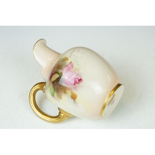 14 - Royal Worcester jug with hand painted Rose decoration, signed R Austin, gilt handle, date code for 1... 