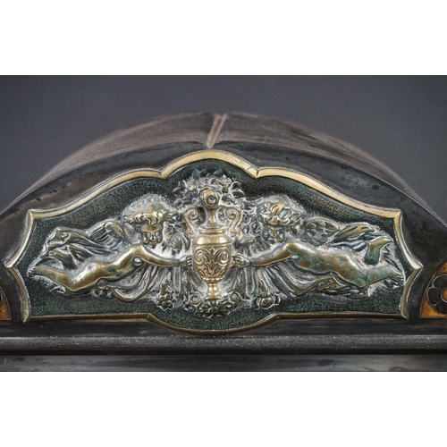 150 - Victorian black slate mantle clock of architectural form, with brass dial, the case with inlaid foli... 