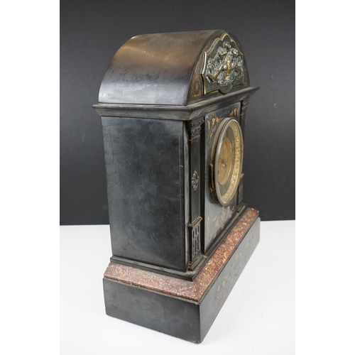 150 - Victorian black slate mantle clock of architectural form, with brass dial, the case with inlaid foli... 