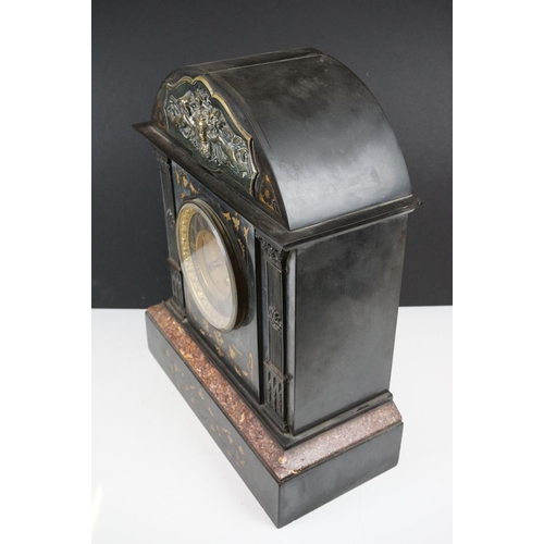 150 - Victorian black slate mantle clock of architectural form, with brass dial, the case with inlaid foli... 