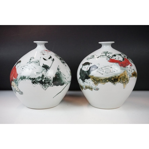 20 - Three 20th century Chinese ceramic vases decorated with scenes of children playing, with character m... 