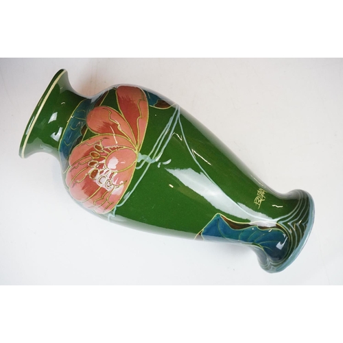 21A - Pair of Phoenix Ware vases of inverted baluster, circa 1920's, with stylised floral decoration on gr... 