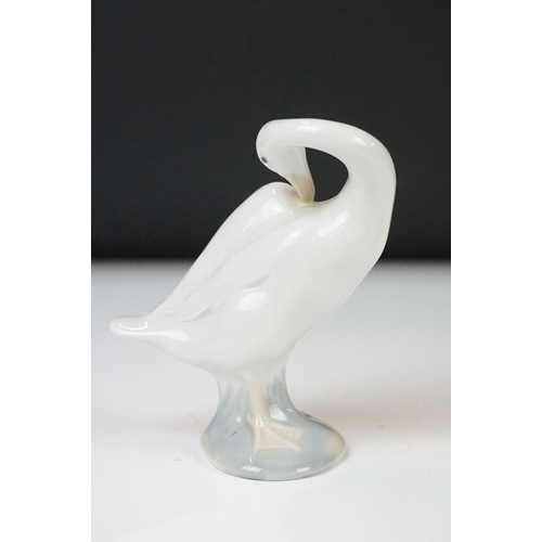 26 - Four Lladro porcelain figures to include 6175 White Swan, 1265 Duck Jumping and two standing geese