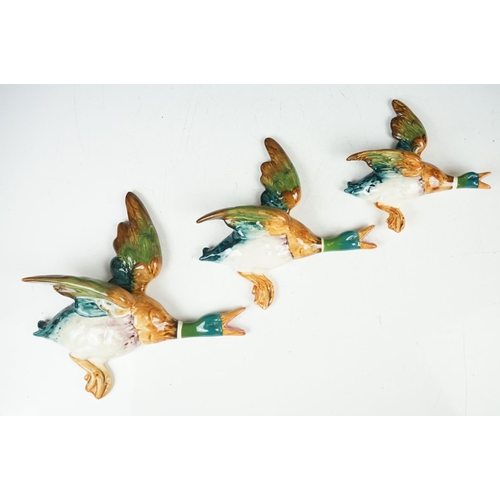 33 - Set of three Beswick flying duck graduating wall plaques, model numbers 596-2, 596-3 & 596-4 (larges... 