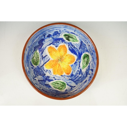 35 - Hazel Leach studio pottery circular bowl, with hand painted floral and butterfly decoration on a blu... 