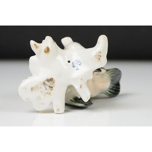 38 - Meissen porcelain paperweight modelled as a recumbent Pug dog (a/f, approx 19cm wide), together with... 