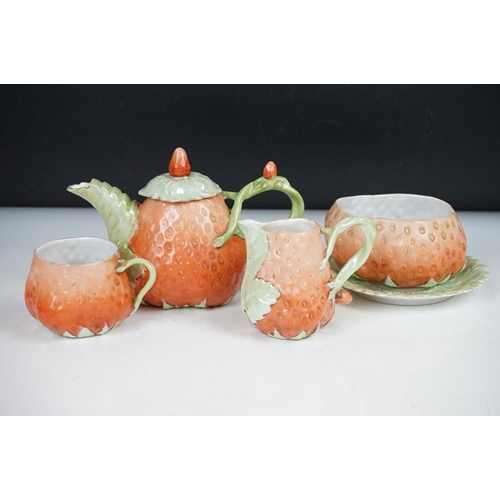 43 - Novelty four-piece tea set in the form of Strawberries, to include a teapot & cover, sugar bowl, mil... 