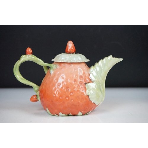 43 - Novelty four-piece tea set in the form of Strawberries, to include a teapot & cover, sugar bowl, mil... 