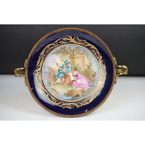 44 - 19th Century French porcelain tazza with hand painted central panel depicting a courting couple (sig... 