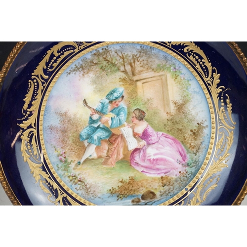 44 - 19th Century French porcelain tazza with hand painted central panel depicting a courting couple (sig... 