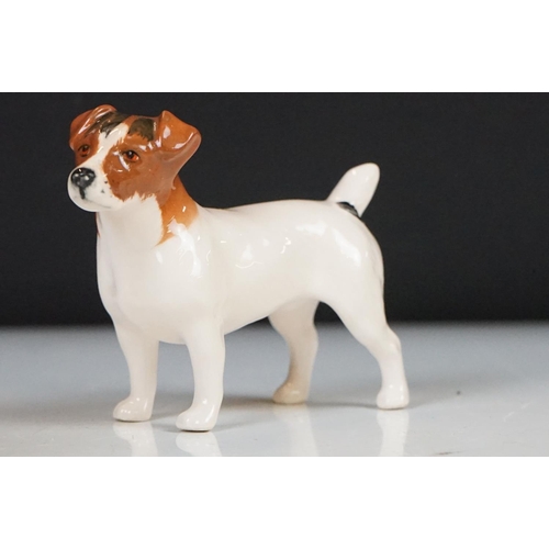 52 - Eight Beswick porcelain dog figures to include Laughing Yorkshire Terrier (2102), German Shephard, D... 