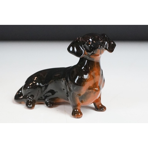 52 - Eight Beswick porcelain dog figures to include Laughing Yorkshire Terrier (2102), German Shephard, D... 