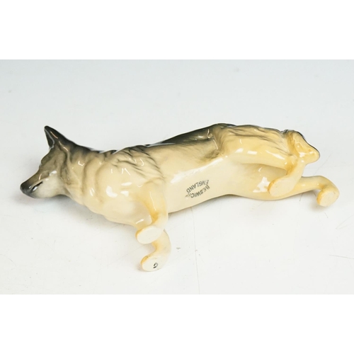 52 - Eight Beswick porcelain dog figures to include Laughing Yorkshire Terrier (2102), German Shephard, D... 