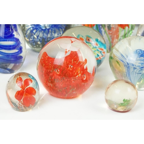 54 - Collection of 20 various sized glass paperweights, some Millefiori.