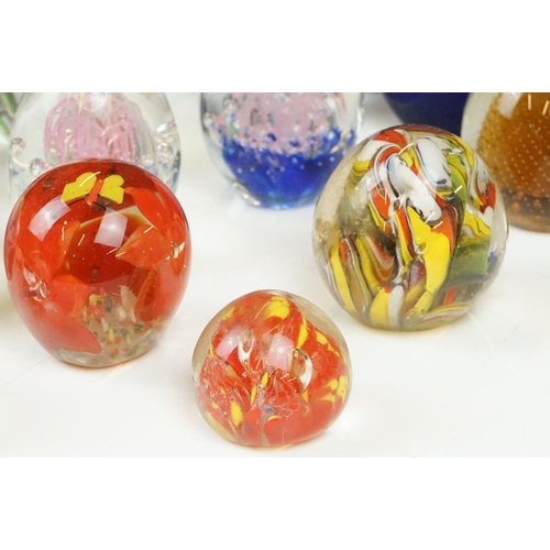 54 - Collection of 20 various sized glass paperweights, some Millefiori.