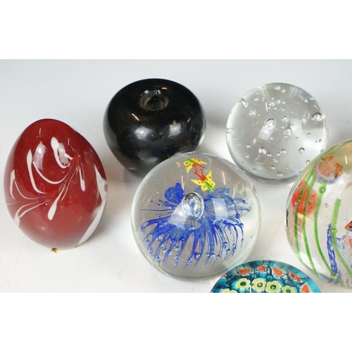 54 - Collection of 20 various sized glass paperweights, some Millefiori.