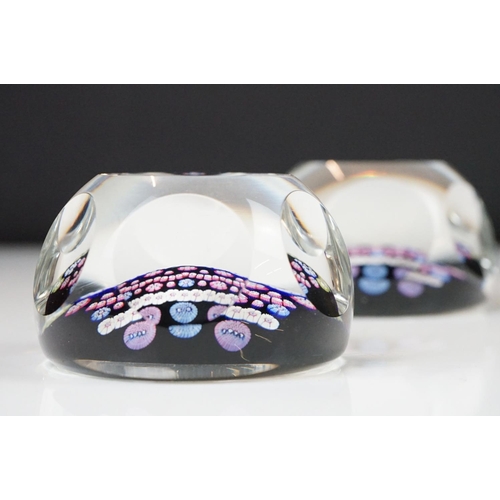 57 - Two Whitefriars QEII silver jubilee faceted glass millefiori paperweights, the millefiori canes depi... 