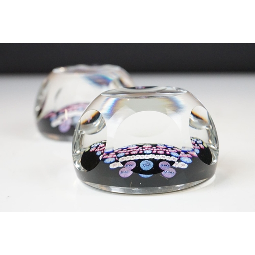 57 - Two Whitefriars QEII silver jubilee faceted glass millefiori paperweights, the millefiori canes depi... 