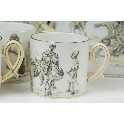 66 - French porcelain part tea / coffee set, decorated with scenes of figures & camels in the desert, to ... 