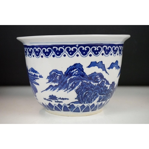 69 - Three Chinese blue & white planters to include a square-form blue ground example with floral decorat... 