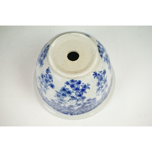 69 - Three Chinese blue & white planters to include a square-form blue ground example with floral decorat... 