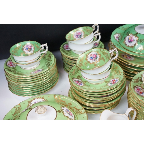 72 - Copeland Spode green ground floral tea & dinner ware, pattern no. R2115, to include 2 tureens & cove... 