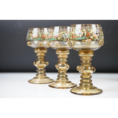 8 - Set of six Bohemian green glass wine glasses, with enamelled floral decoration, applied floral embel... 