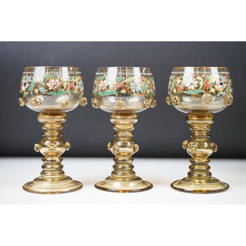 8 - Set of six Bohemian green glass wine glasses, with enamelled floral decoration, applied floral embel... 