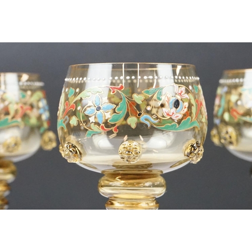 8 - Set of six Bohemian green glass wine glasses, with enamelled floral decoration, applied floral embel... 