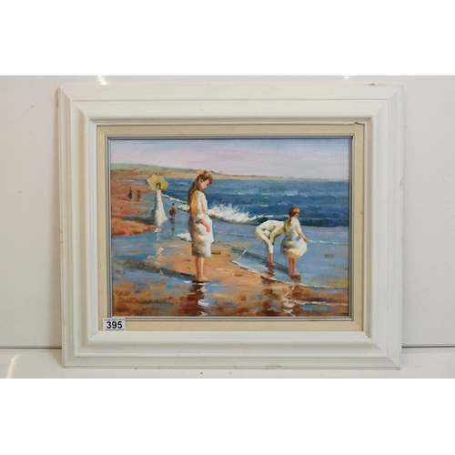 395 - Oil on canvas of an impressionist beach scene with children beachcombing, 29.5cm x 39.5cm