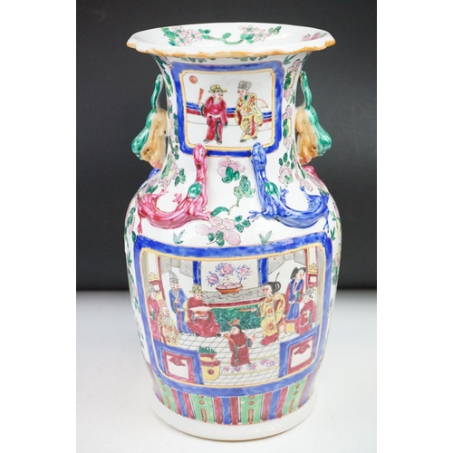 83 - Cantonese Famille Rose vase enamel decorated with figural panels, applied dragons, twin handles mode... 