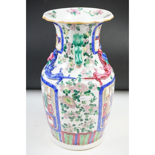 83 - Cantonese Famille Rose vase enamel decorated with figural panels, applied dragons, twin handles mode... 