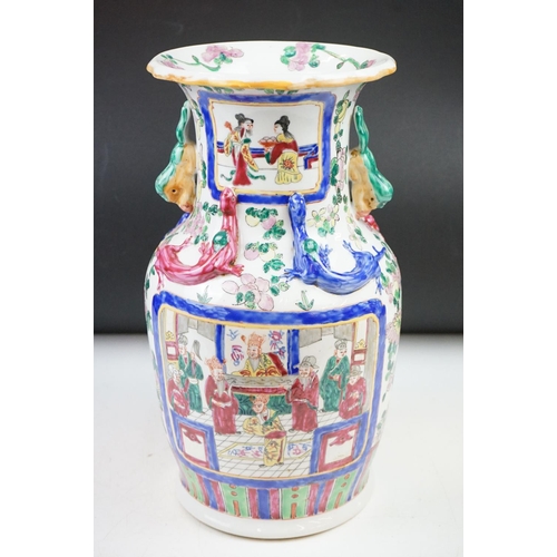 83 - Cantonese Famille Rose vase enamel decorated with figural panels, applied dragons, twin handles mode... 