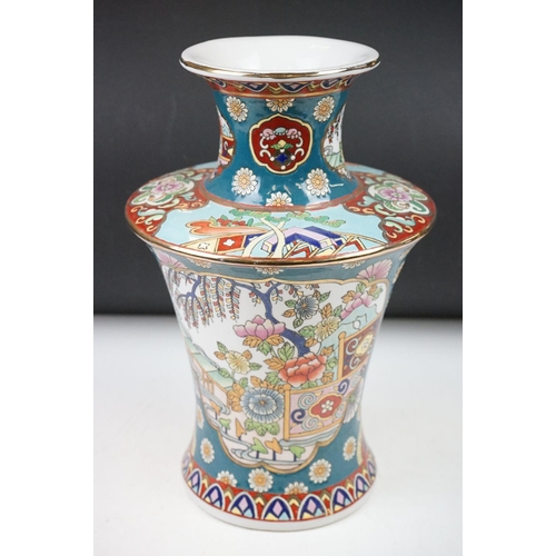 83 - Cantonese Famille Rose vase enamel decorated with figural panels, applied dragons, twin handles mode... 