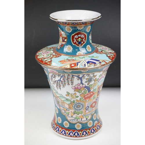 83 - Cantonese Famille Rose vase enamel decorated with figural panels, applied dragons, twin handles mode... 