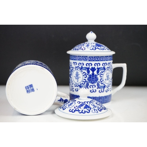 94 - Six Chinese blue and white mugs & covers, three pairs, the designs including floral, foliate and cha... 