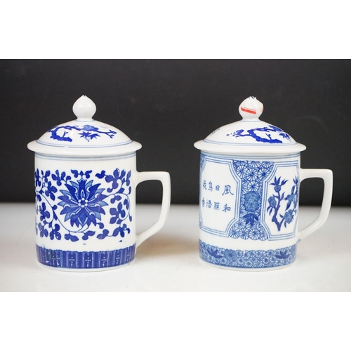 94 - Six Chinese blue and white mugs & covers, three pairs, the designs including floral, foliate and cha... 