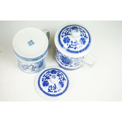 94 - Six Chinese blue and white mugs & covers, three pairs, the designs including floral, foliate and cha... 