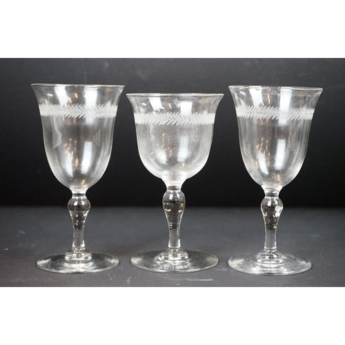 98 - Set of early 20th century etched glassware to include 20 glasses (16 sherry & 4 wine), 2 decanters &... 