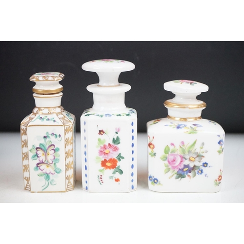 99 - Collection of 14 Continental porcelain perfume bottles & stopper, 19th century onwards, the bottles ... 