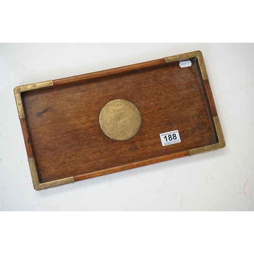 188 - An antique mahogany writing slope with brass fittings together with a wooden Chinese tray with brass... 